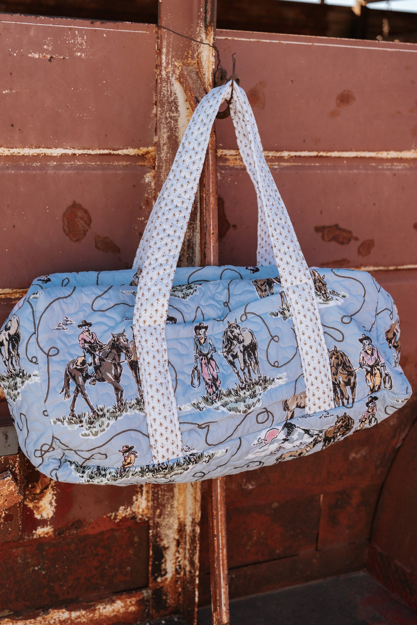 The Blue Cowgirl Traveler