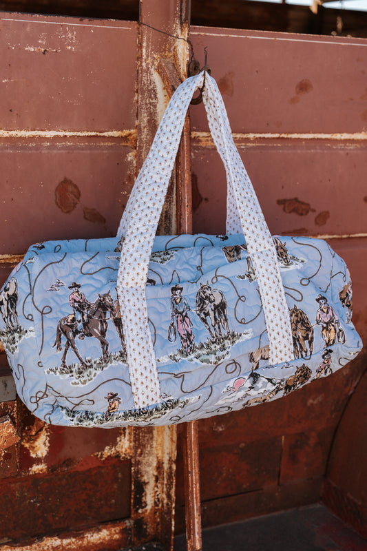The Blue Cowgirl Traveler
