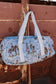 The Blue Cowgirl Traveler